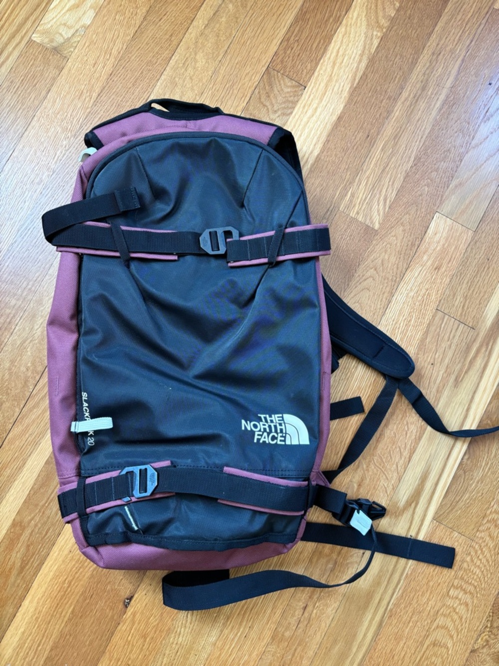 The North Face Black and Burgundy Backpack with Strap Details